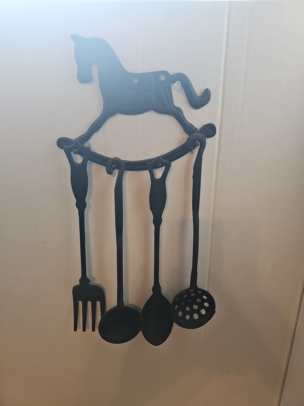 vintage black cast iron rocking horse wall-mounted kitchen utensil holder